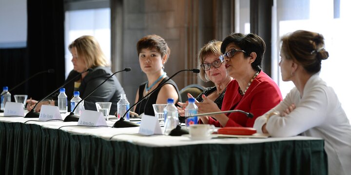 Several women at a table presenting at the Changing Food Environment speaker panel at the 2015 Food and Family Conference in Chicago