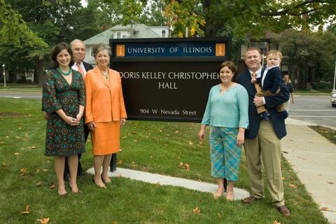 Doris Kelley Christopher (in orange dress) and her family